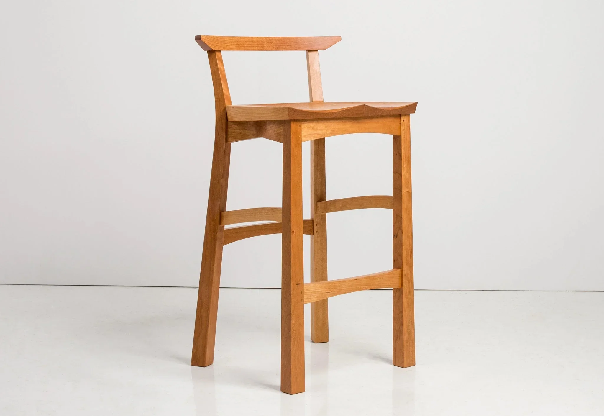 Stool - Made of hand-finished hardwoods, this stool's craftsmanship is every bit as evident as its form, with