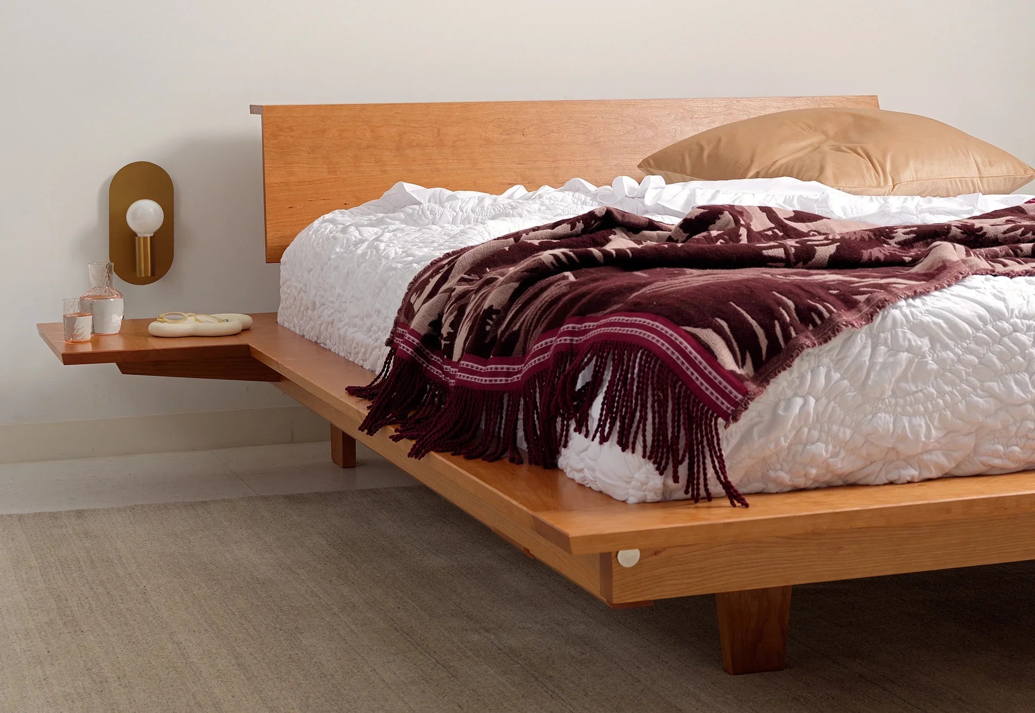 Platform Bed - The is minimalist to its core, stripping away pretense with its series of broad, surrounding surfaces