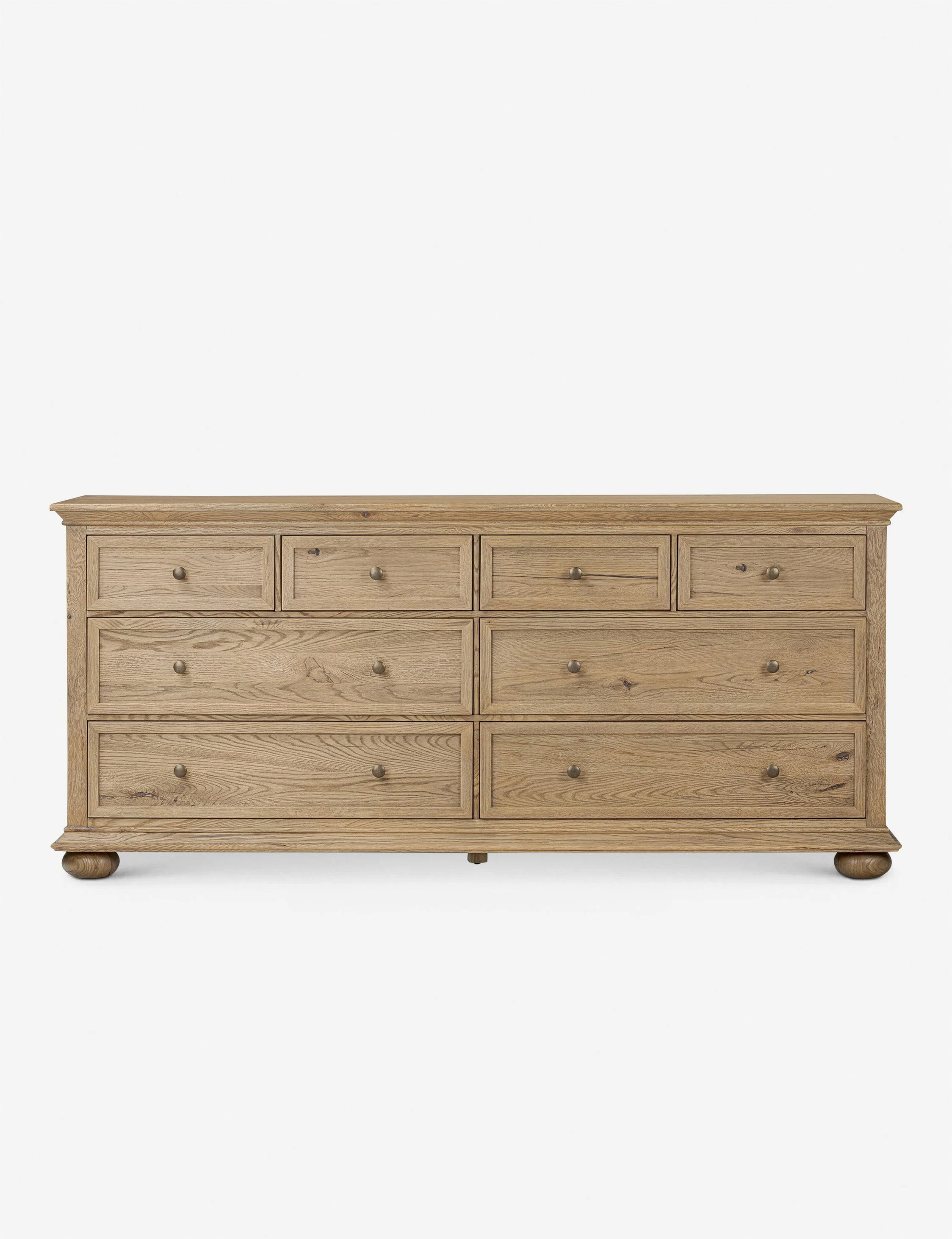 Dresser x Oak, Vintage, Drawers Bun feet add a vintage touch of craftsmanship to this wooden dresser. Its wide silhouette delivers eight spacious