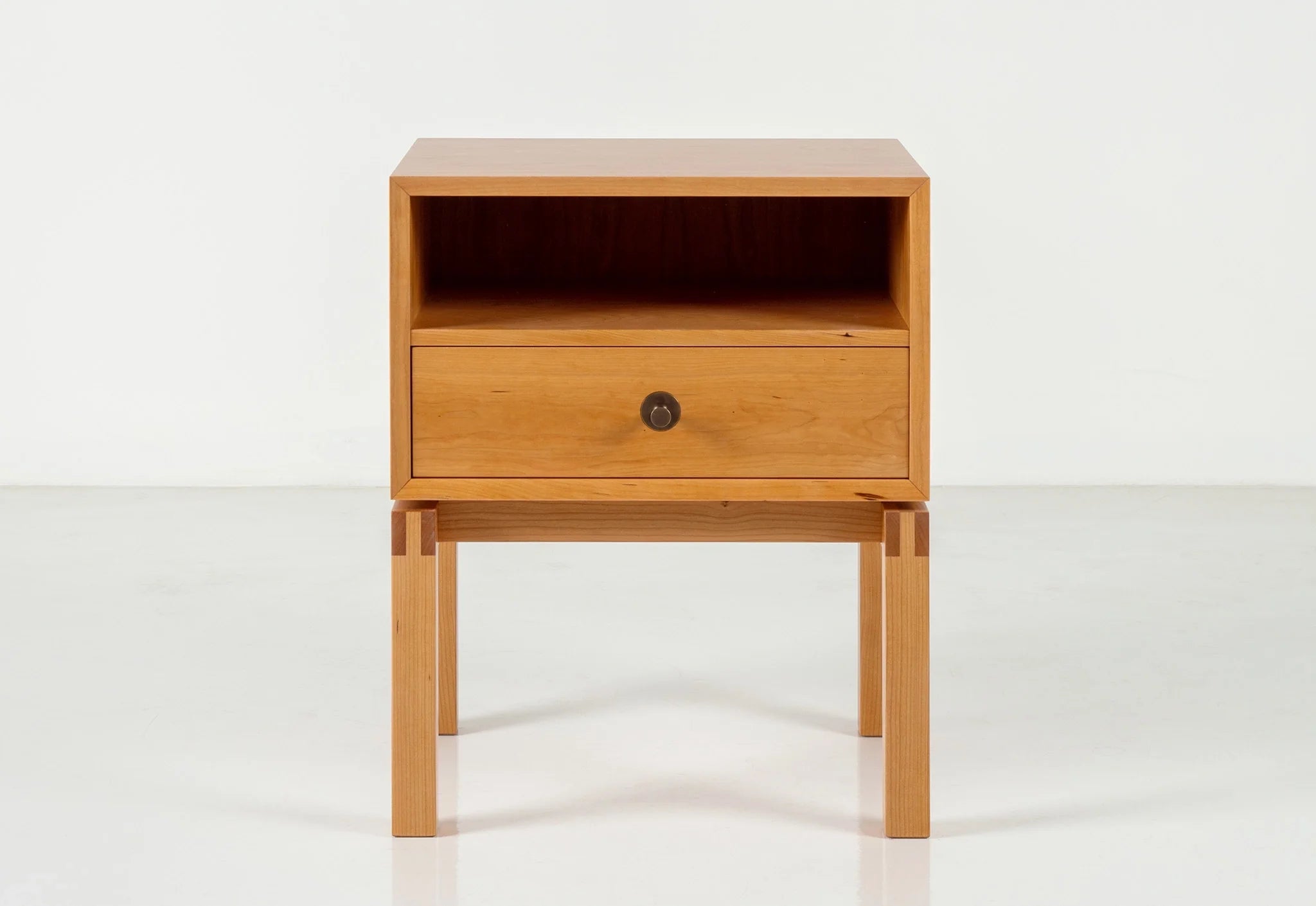Side Table - Designed with cues from its namesake bed, the is a modest example of fine craftsmanship