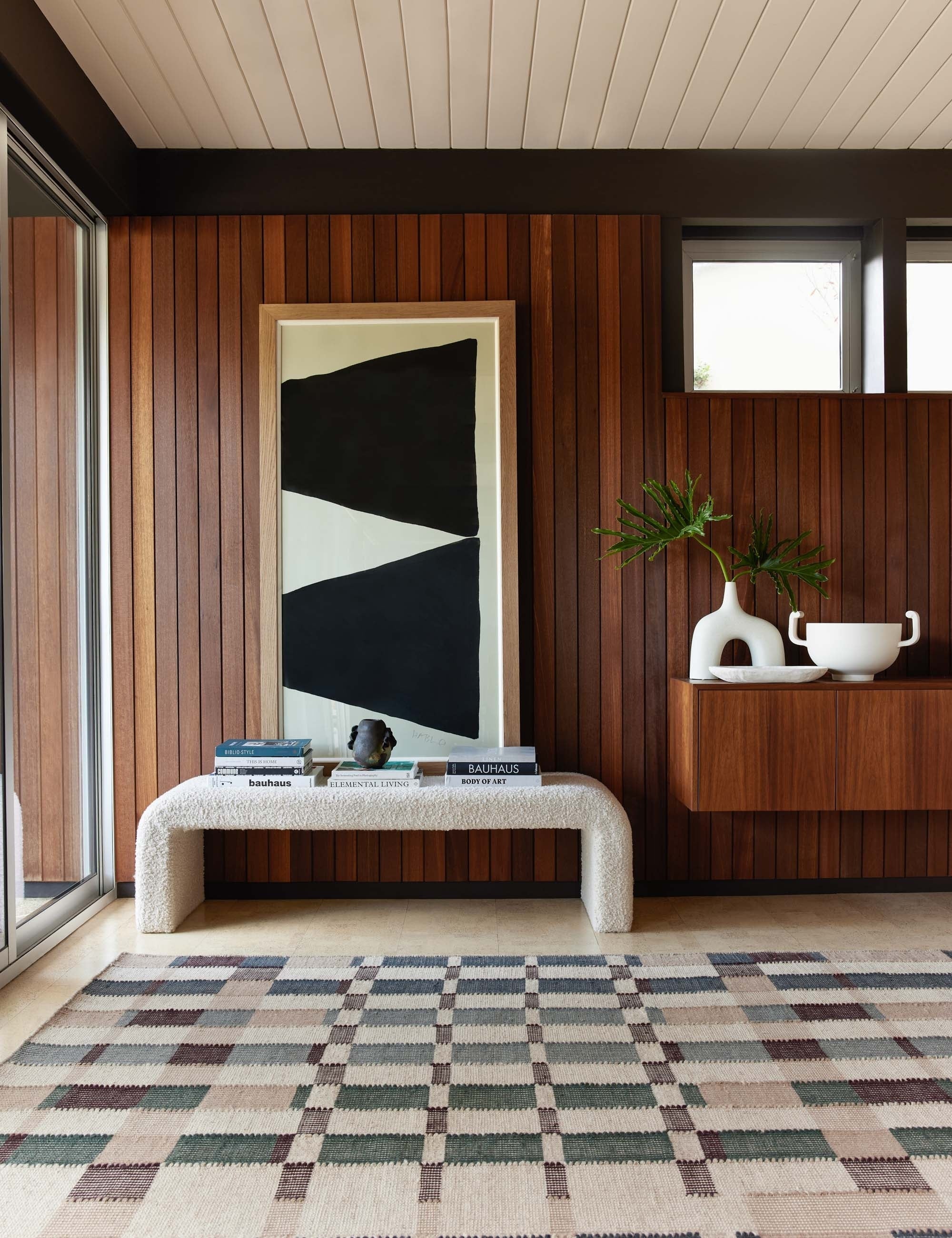 Bench Our bench offers a streamlined silhouette with a soft presence. Its clean lines and upholstery will fold seamlessly into your decor
